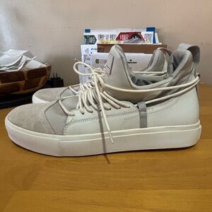 Article Number Gray and White Sneakers.